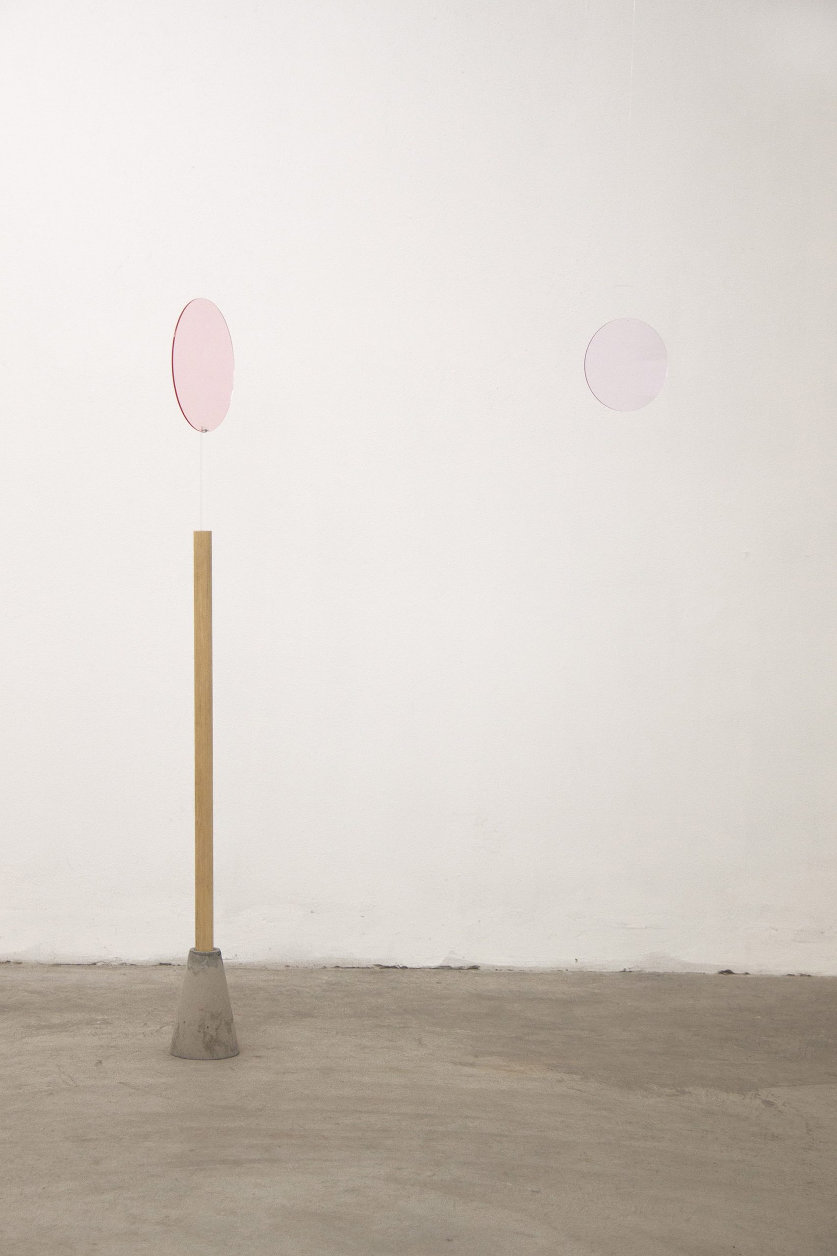 Giulia Fumagalli, “Lasciarsi eclissare rosa - rosa”, 2019, plexiglass, adhesive films, nylon wire, wood, cement, 145 cm x variable dimensions